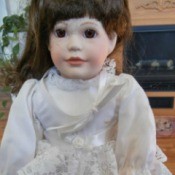 doll in lacy white dress