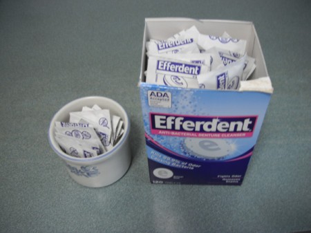 Efferdent tablets in a small container for the bathroom counter.