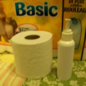 A spray bottle for moistening toilet paper