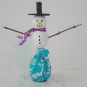 Making a Tootsie Pop Snowman