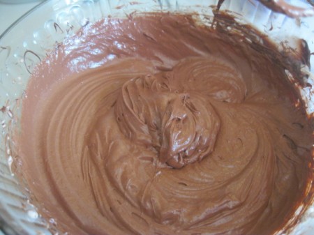 Whipped chocolate in a glass bowl.