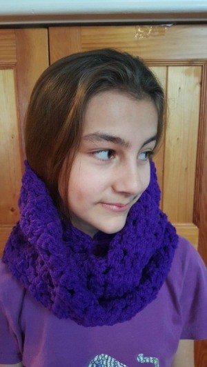 young girl wearing the cowl