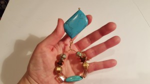 pendant with large blue stone bead