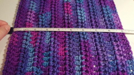 measuring the width of the hooded scarf, more rows can be added to increase the width