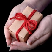 hands holding a wrapped gift