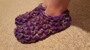 Thick Crocheted Slippers - on child's feet