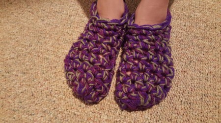 Thick Crocheted Slippers -  top down view of slippers on child's feet
