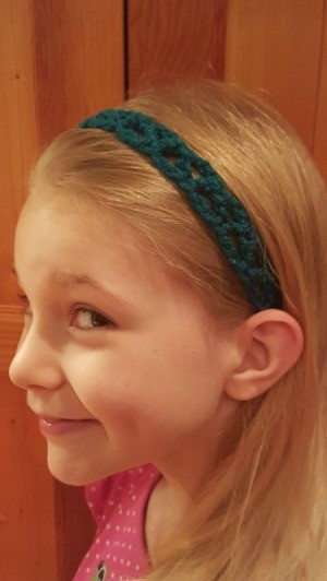 young girl wearing headband