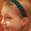 young girl wearing headband