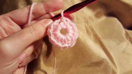 Crocheting the flower.