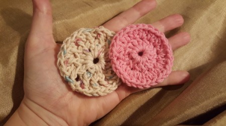 two finished crochet facial rounds