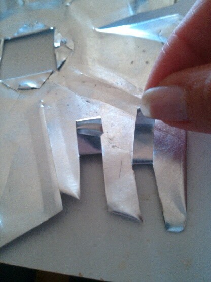 fold up notches and fold ends of notches over