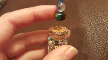 Message in a Bottle Pendant - put a drop of glue on cork and insert head pin