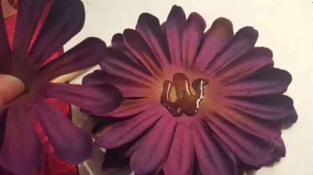 add glue to back of flower