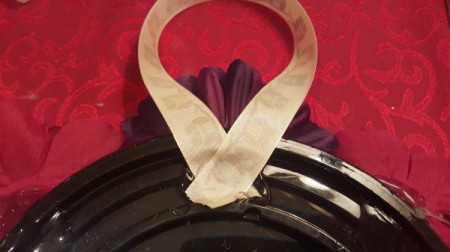 ribbon hanger attached to back of platter