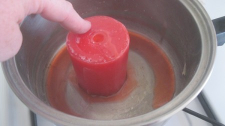Teacup Candle - melting the candle with the wick removed in a pan on stove