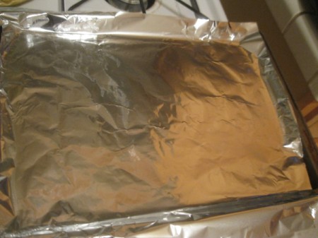 Melted Perler Beads - foil lined baking pan