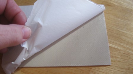 remove paper from self stick tile