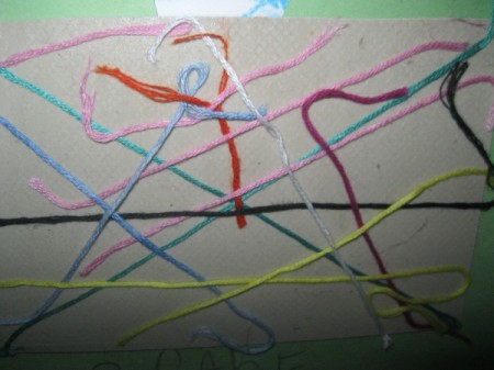 random yarn painting project in progress