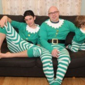 dad and sons wearing elf pjs