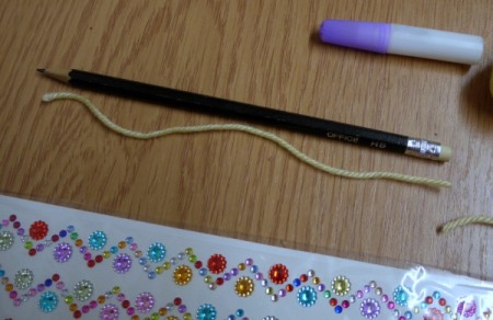 Yarn Flower Hair Clip - cut pencil length piece of yarn