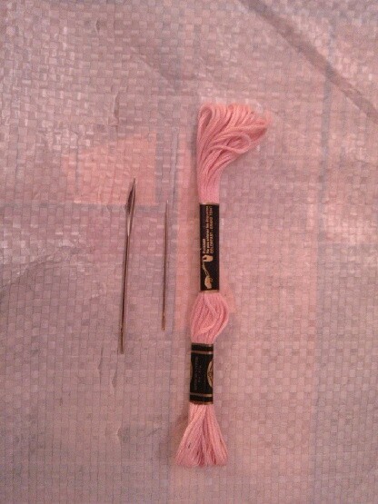 pink embroidery floss and large needle for sewing down top edge of tote