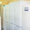 row of white refrigerators