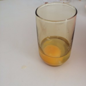 drinking glass with egg
