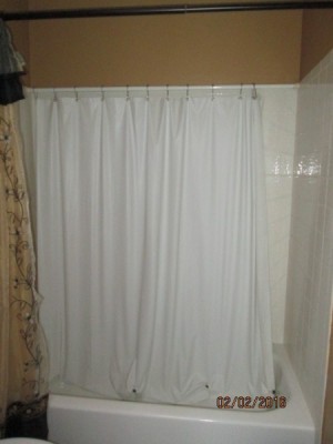Use Second Curtain to Keep Shower Wall Clean