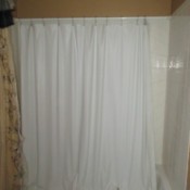 Use Second Curtain to Keep Shower Wall Clean