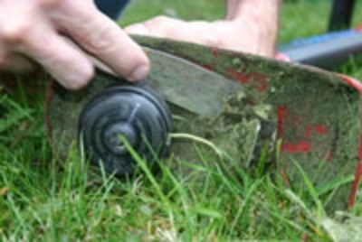 Cleaing Grass Out of Mower