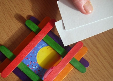 add a piece of cardstock behind the picture if it is too loose