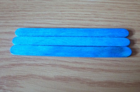 three blue sticks to begin making a base