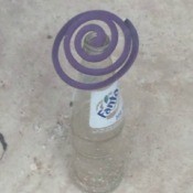coil in soda bottle