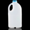 A single plastic 1/2 gallon milk jug against a black background.