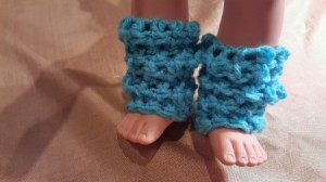 blue crocheted leg warmers