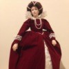 doll in fancy dark red dress over petticoats