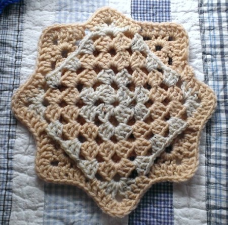 Finished crocheted coaster.