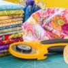 rotary cutter with a stack of fabric