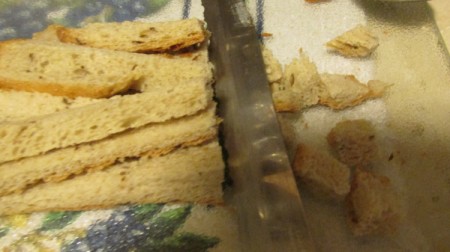 Best Homemade Croutons - chopping up the bread