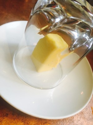 butter under glass