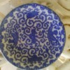 blue intricate vine and bird pattern