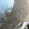 Dirty car covered in water marks