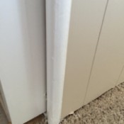 closeup of corner trim on mobile home wall