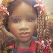 brown skinned doll with braids