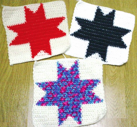 Crocheted squares with different colored stars.