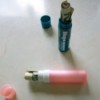 roll of money inside Chapstick containers