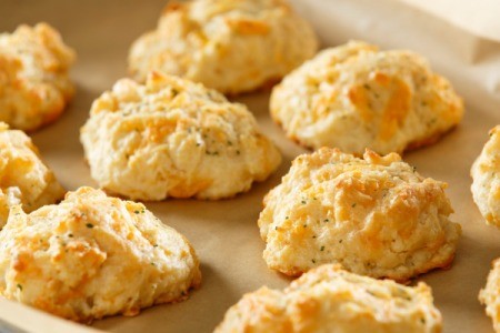 Baked cheese Biscuits on a stoneware tray