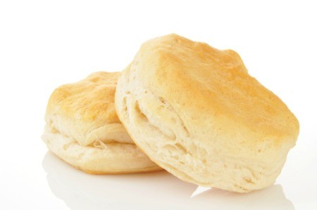 Two biscuits on a white background
