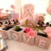 Boxes spelling "LOVE" displayed on a dessert buffet